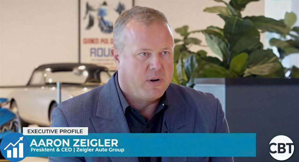 Aaron Zeigler speaking at an automotive industry event or CBT News